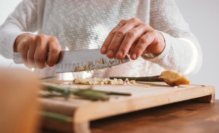 Person chopping vegetables